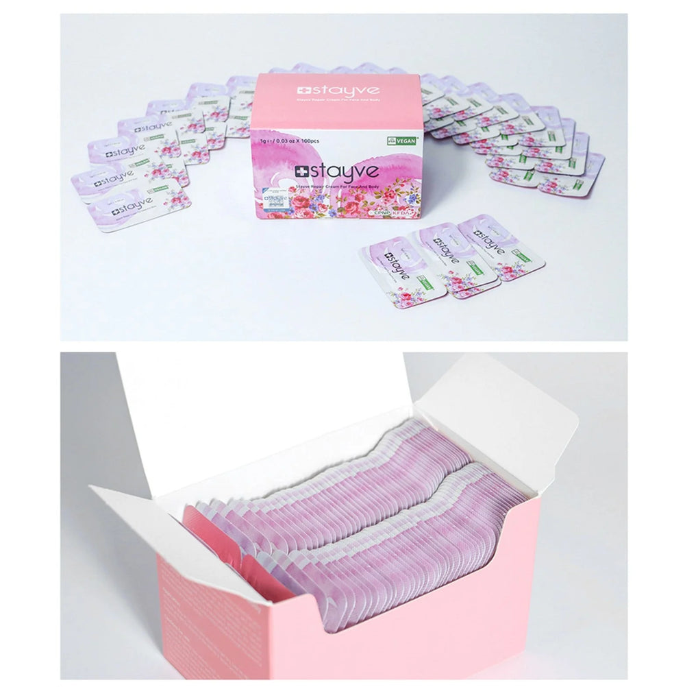 Stayve Repair Cream For Face And Body box with sachets around the packaging, and neatly stacked inside an open box.