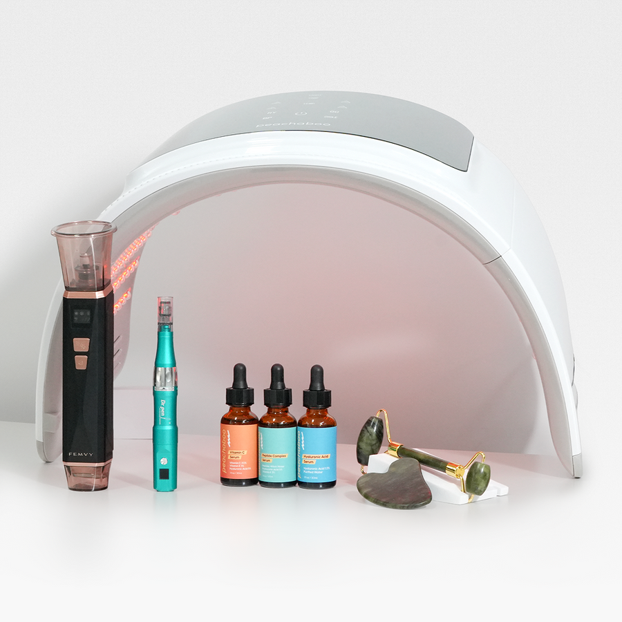 Inside a white box are a therapy pod, bottle of skin serums and Guasha, all included in the Best Sellers Pro Kit.
