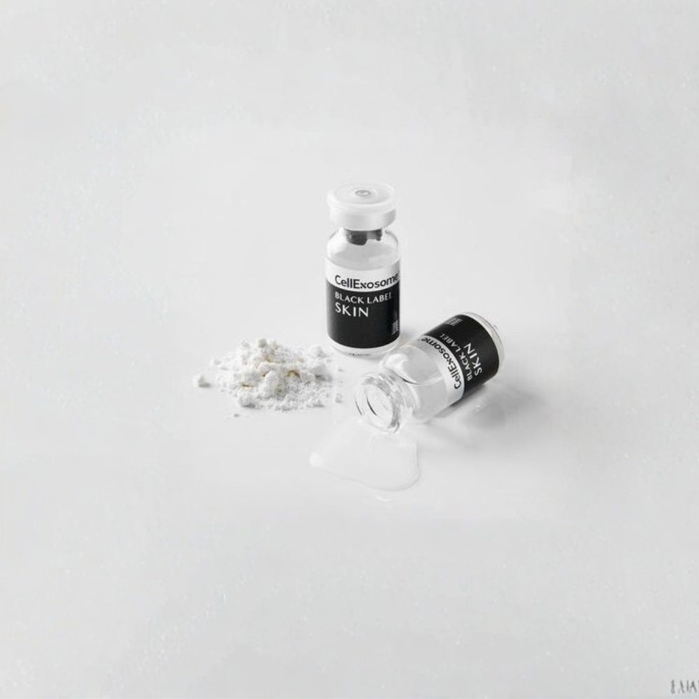 CellExosome Black Label Skin lyophilised powder vial with Solvent vials on a white background