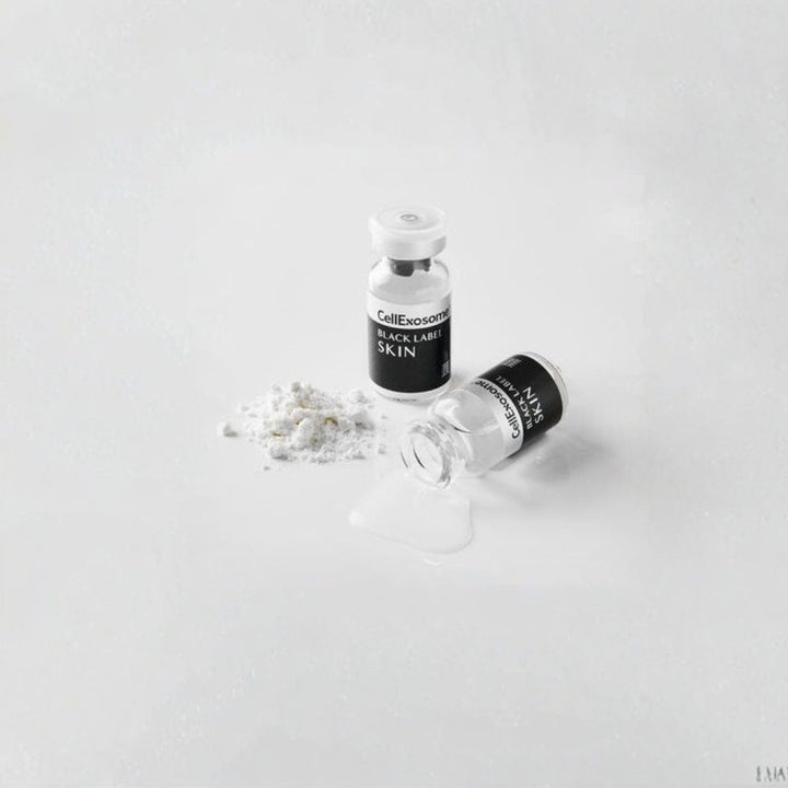 CellExosome Black Label Skin lyophilised powder vial with Solvent vials on a white background