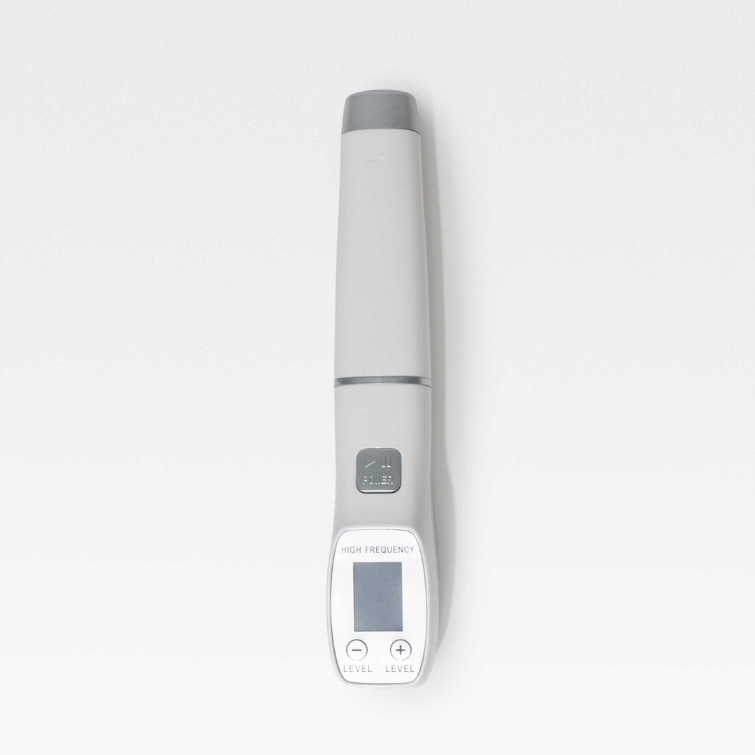 Close-up of the Peachaboo High-Frequency Therapy Wand handle on a white background.