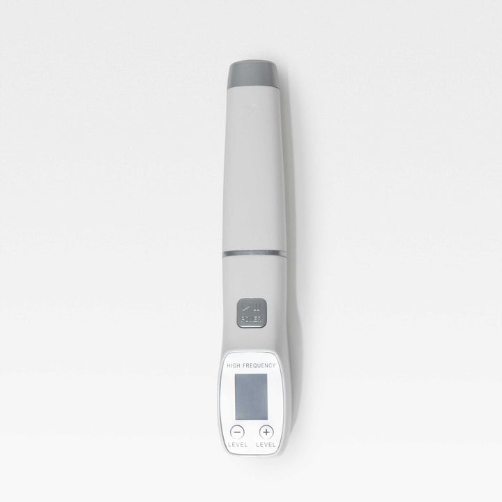 Close-up of the Peachaboo High-Frequency Therapy Wand handle on a white background.