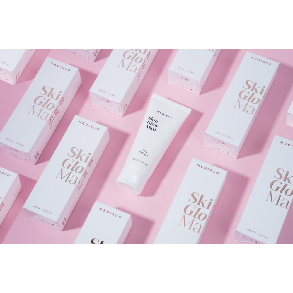 Medisco SkinGlow PDRN Collagen Mask displayed with product boxes on a pink background.