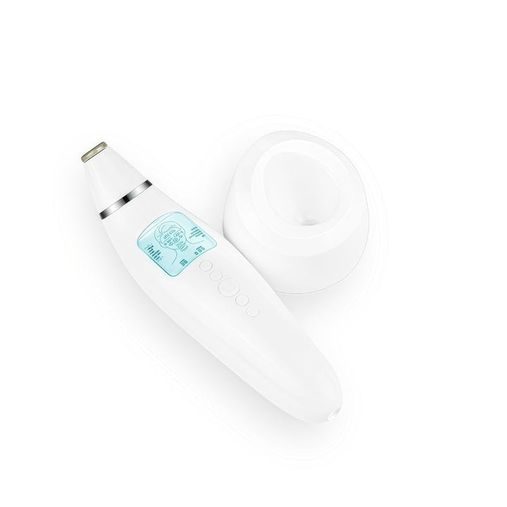 Diamond microdermabrasion pore vacuum device with charging base shown from angled top view