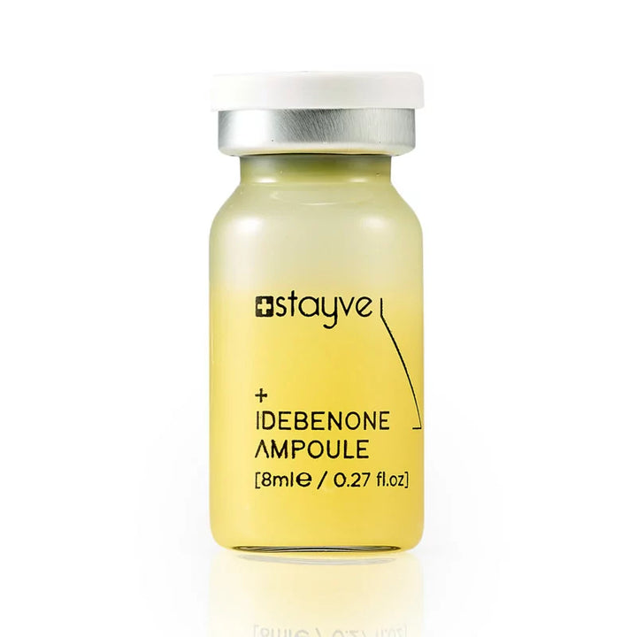 close up to single Stayve Idebenone Ampoule bottle on a white background