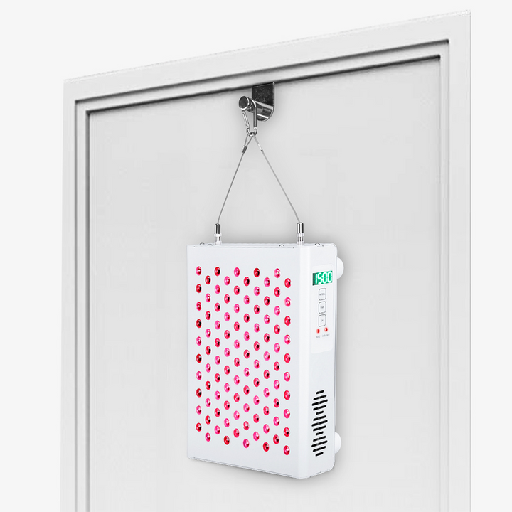 PeakMe Red Light Therapy Kit on the back of a door frame