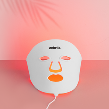 Load image into Gallery viewer, zobelle lumiere silicone led light therapy mask with lights on